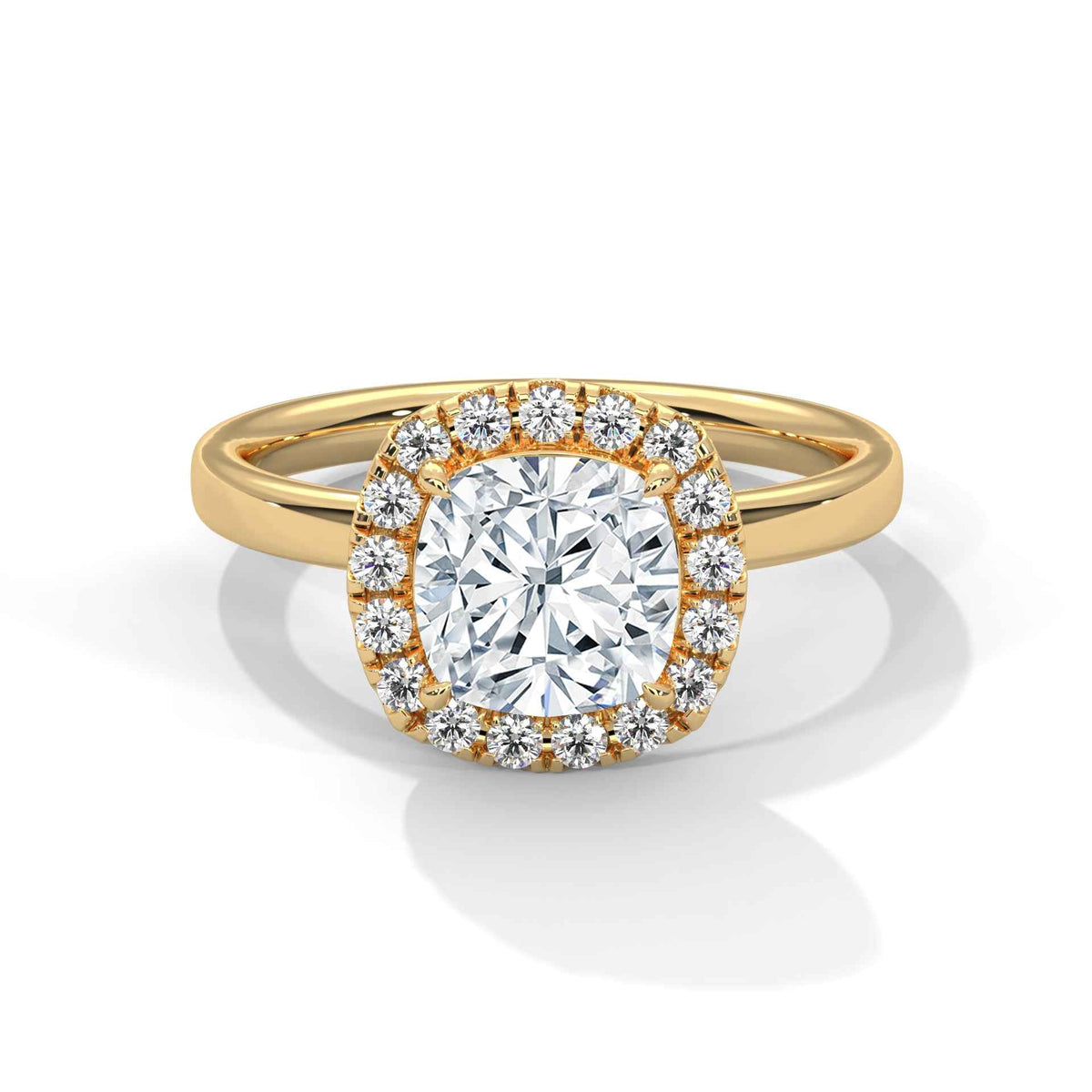 A yellow gold ring with a large round brilliant-cut center diamond surrounded by a halo of smaller diamonds, set on a polished gold band against a clean white background.