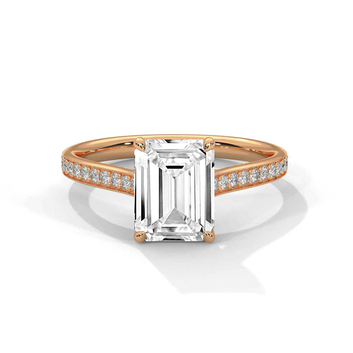 Rose gold ring with a large diamond and smaller diamonds on the band against a white background