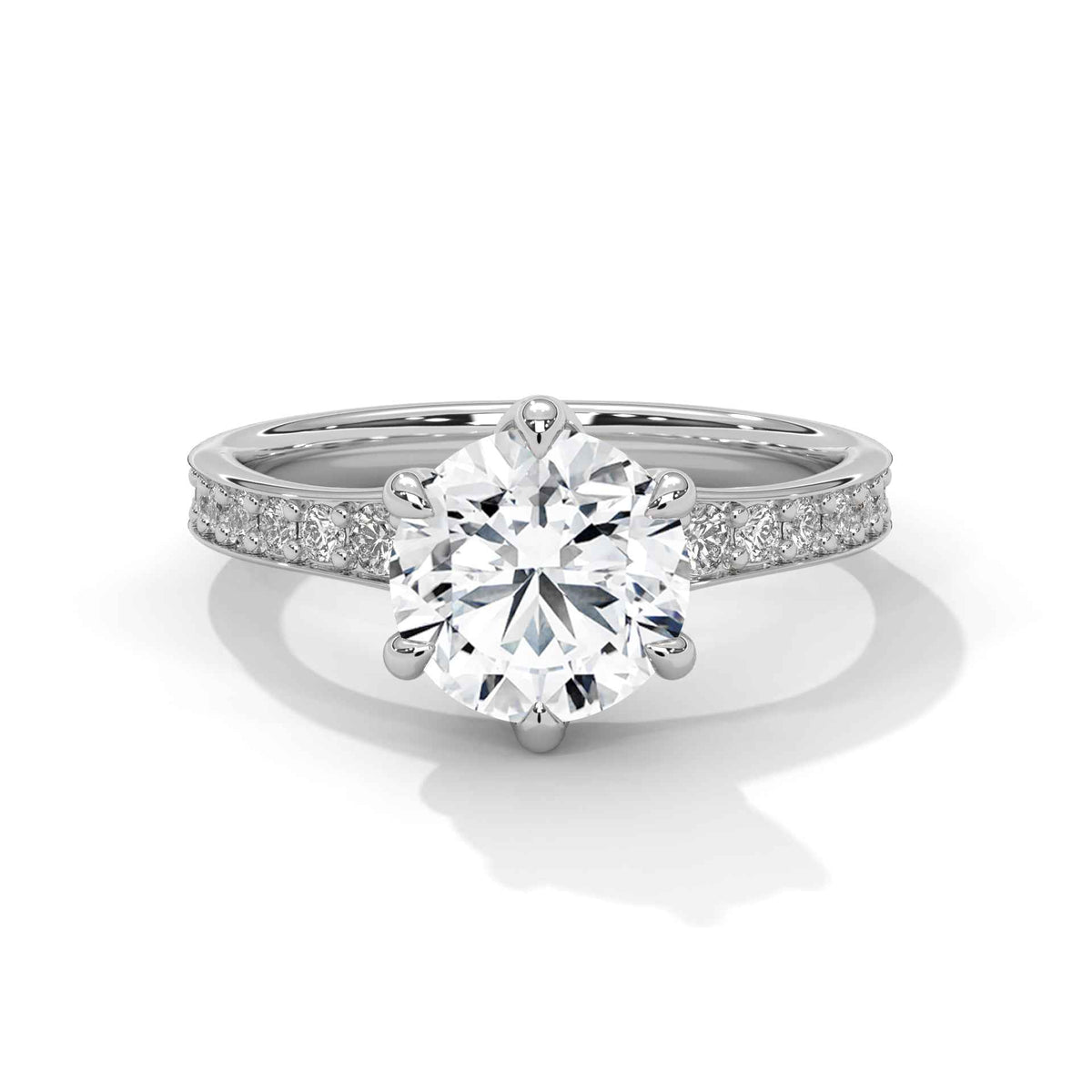 Diamond ring with a white gold band on a white background