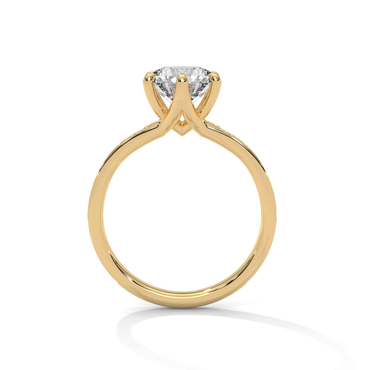 Gold ring with a diamond on a white background