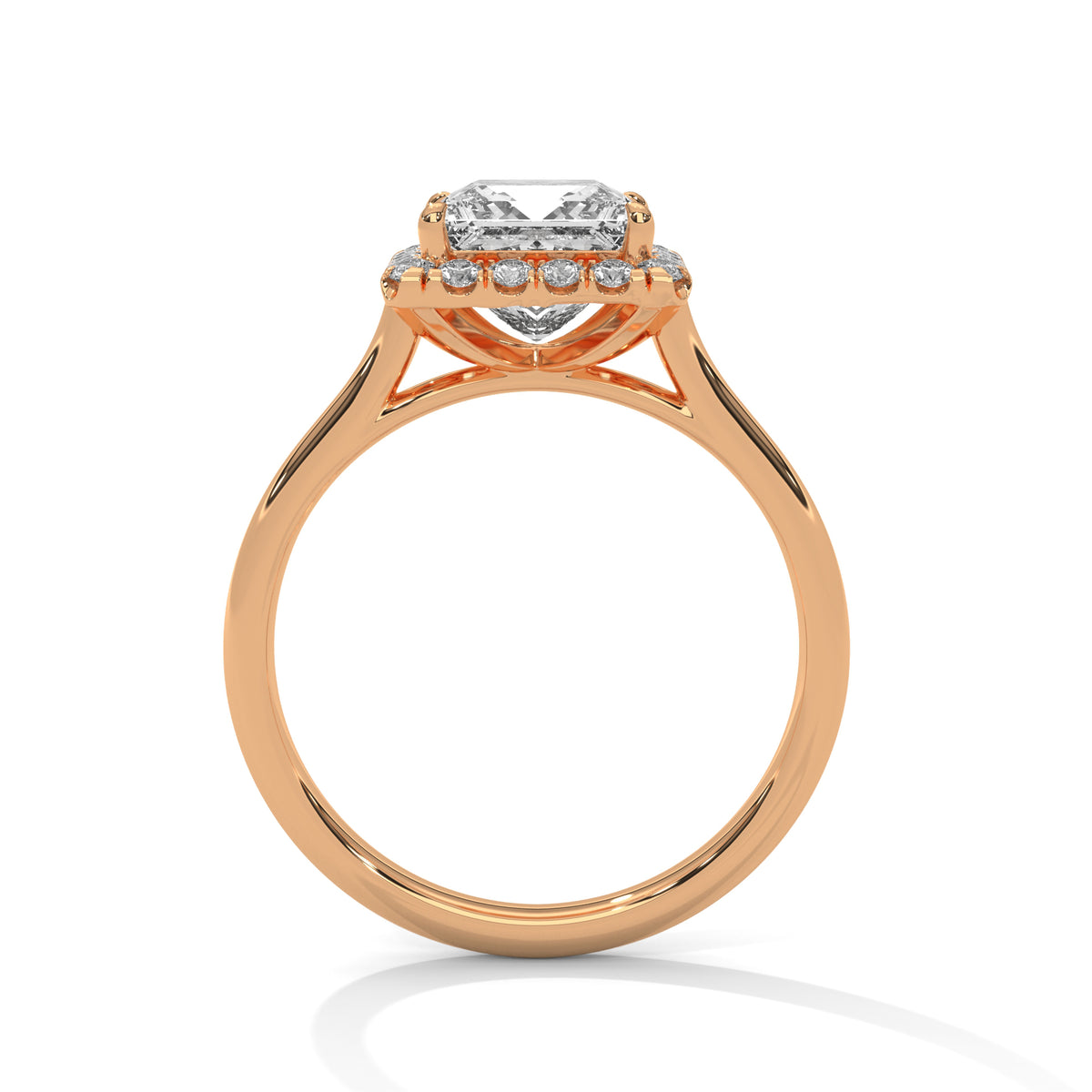 Rose gold ring with a diamond on a white background
