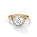 Gold ring with a large diamond and smaller diamonds around on a white background