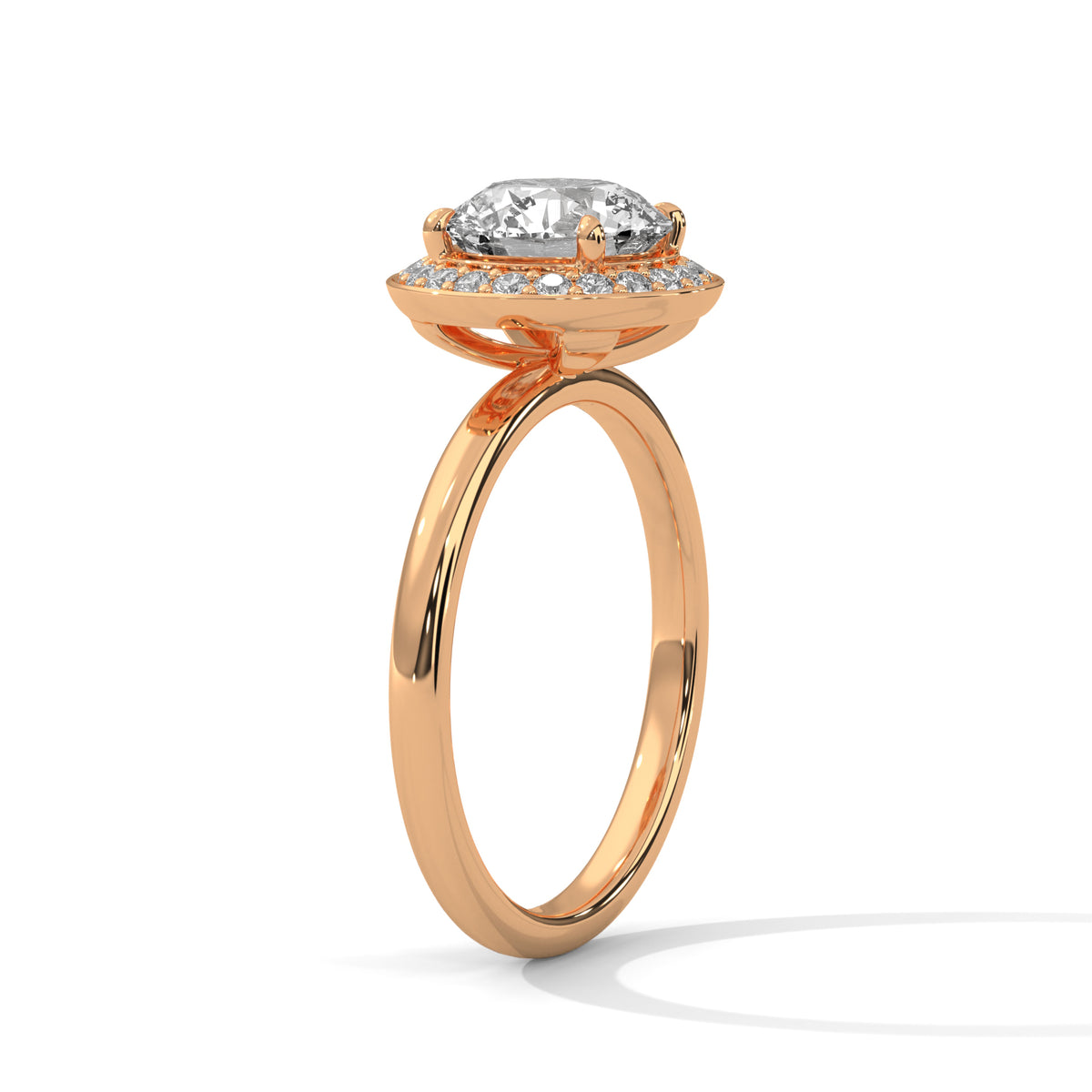 Rose gold ring with a diamond on a white background
