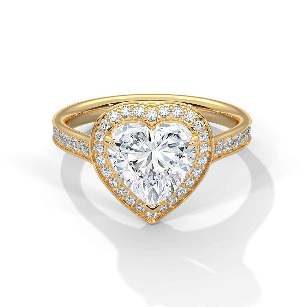 Heart-shaped diamond ring with gold band on a white background
