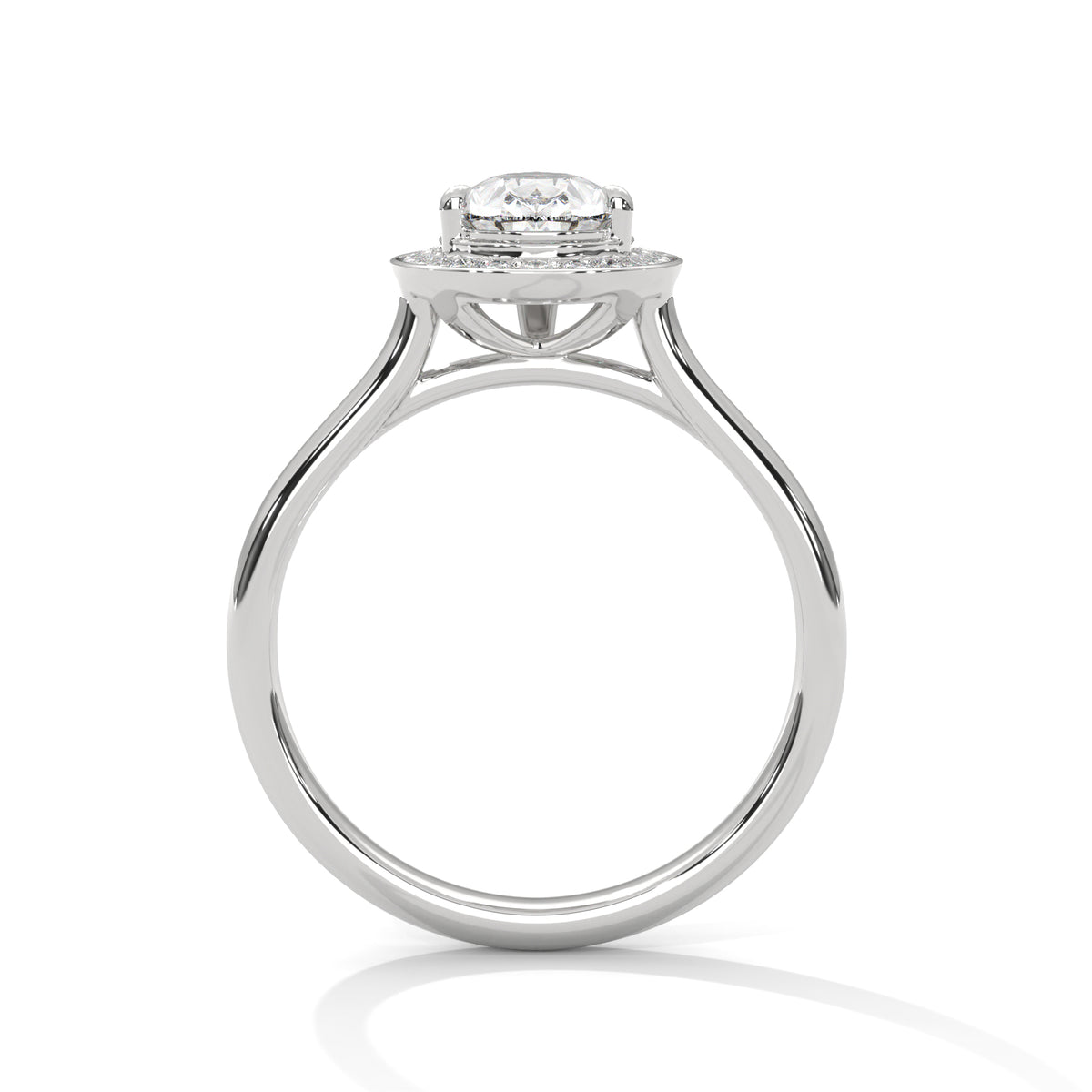 Silver ring with a heart-shaped diamond on a white background