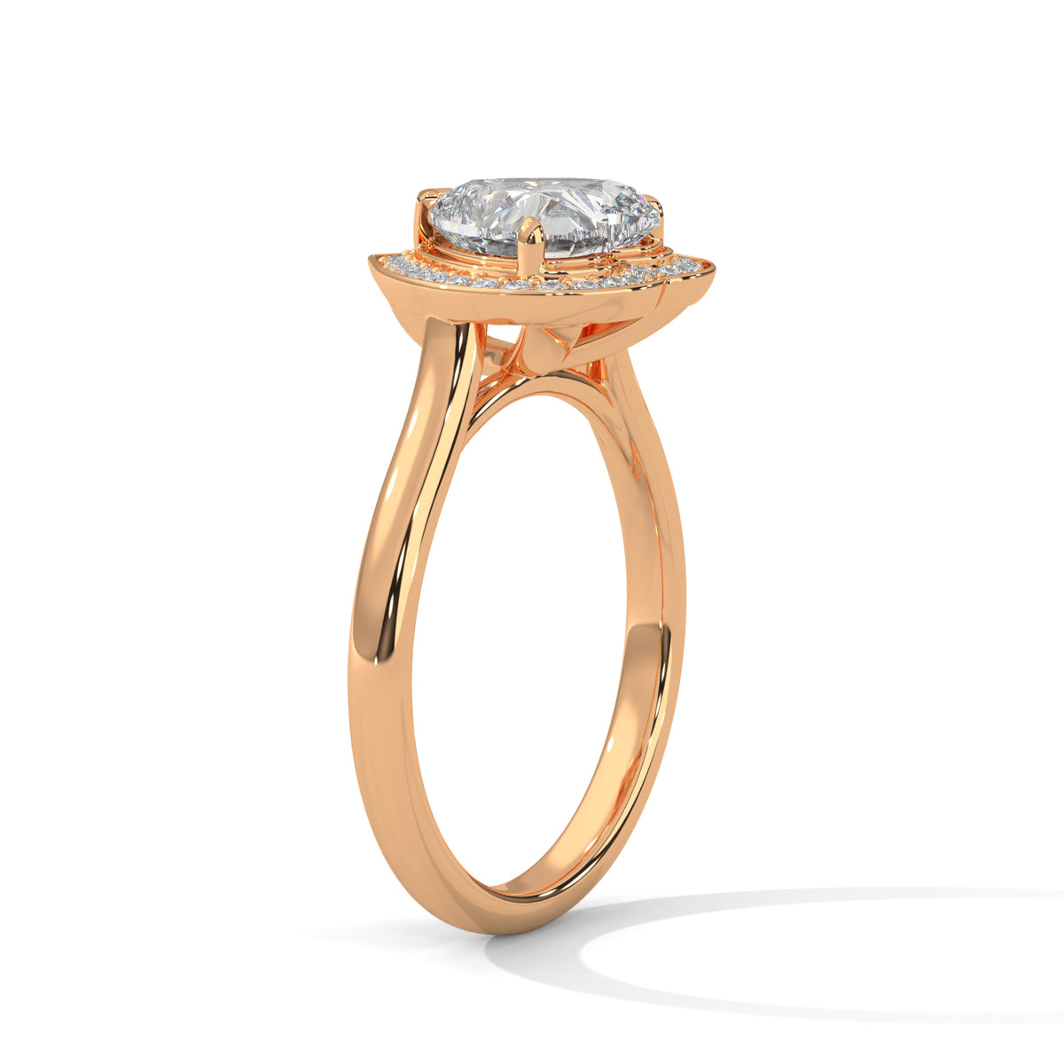 Rose gold ring with a diamond on a white background