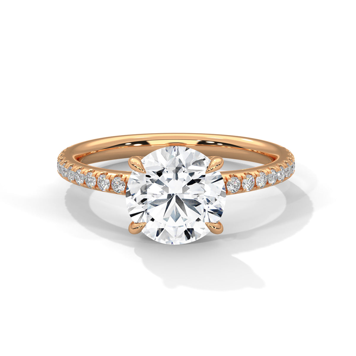 Rose gold ring with a large diamond and smaller diamonds on the band against a white background