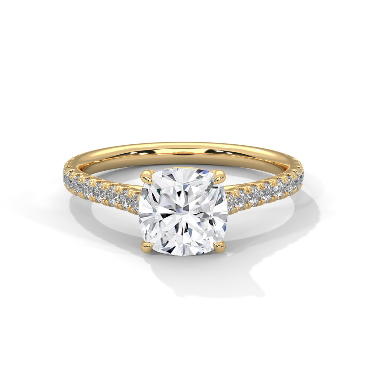 Gold ring with a large diamond and smaller diamonds on the band against a white background