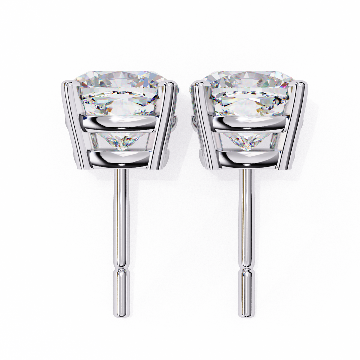 Pair of silver stud earrings with clear gemstones on a white background