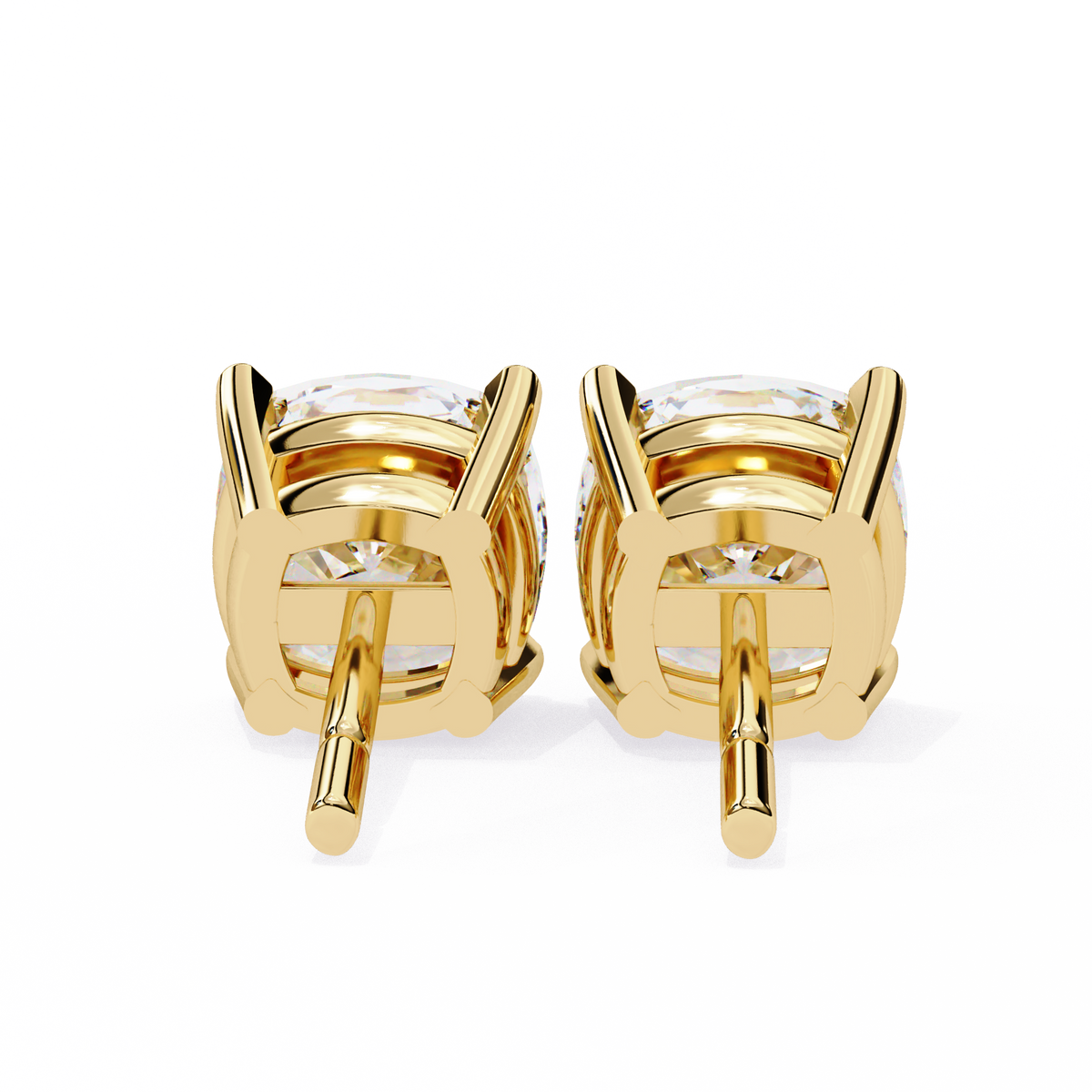 Gold earrings with clear gemstones on a white background