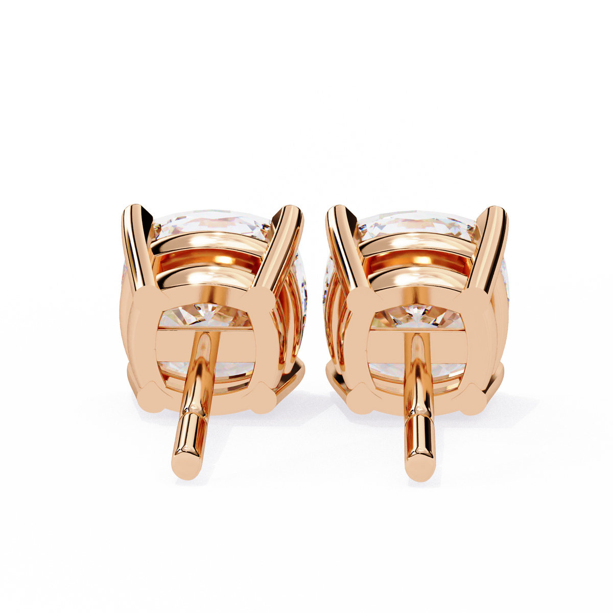Rose gold earrings with clear gemstones on a white background