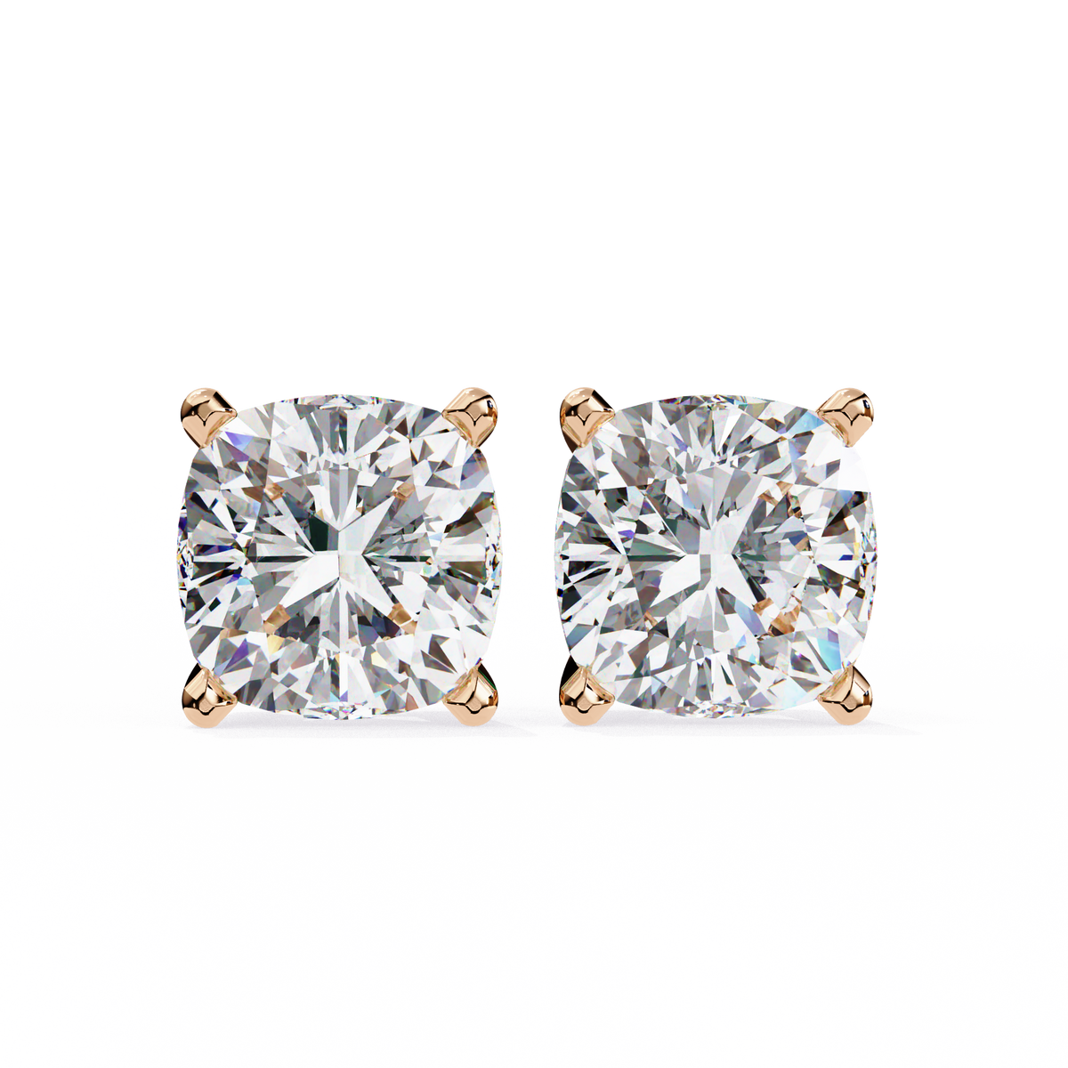 Pair of diamond stud earrings on a white background