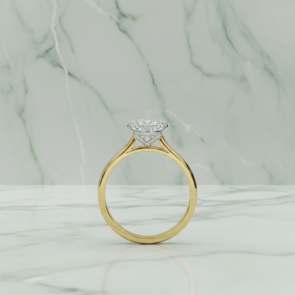Gold ring with a diamond on a white background