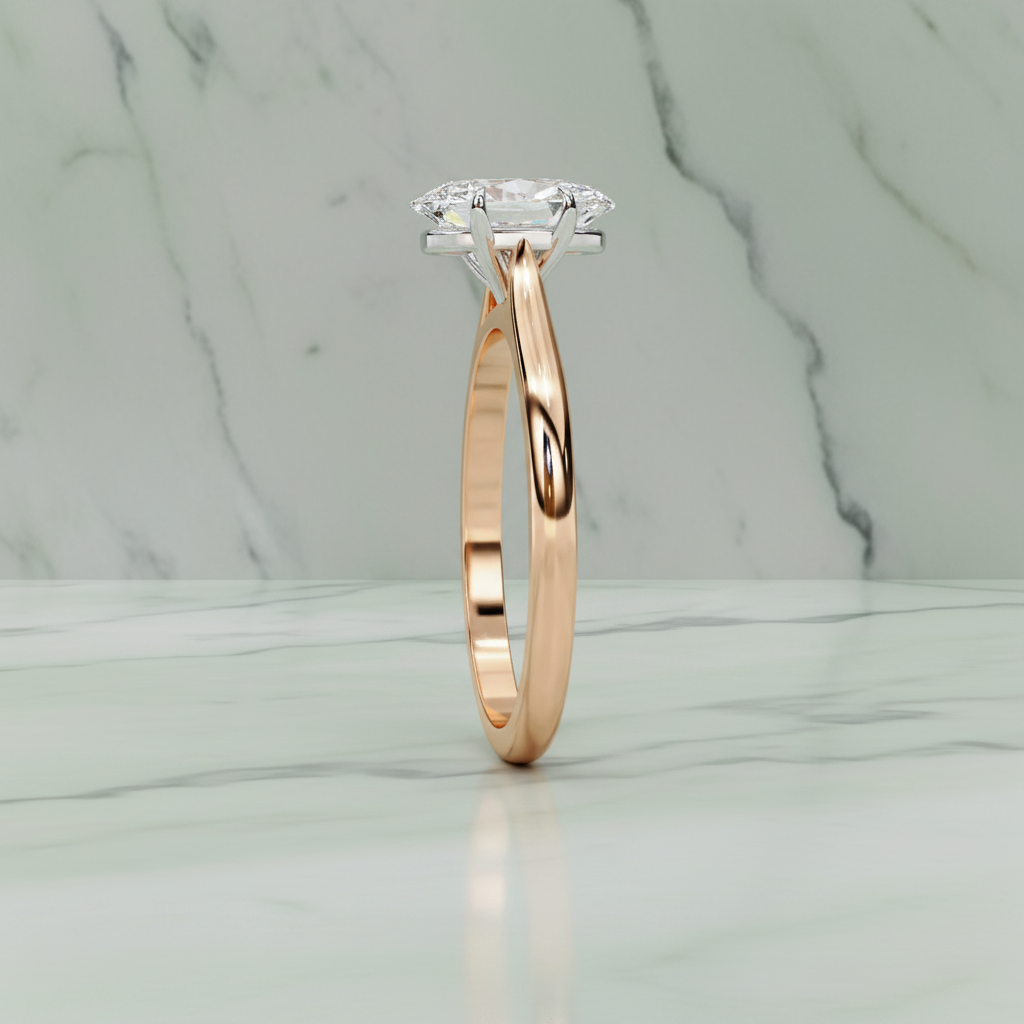 Rose gold ring with a diamond on a white background