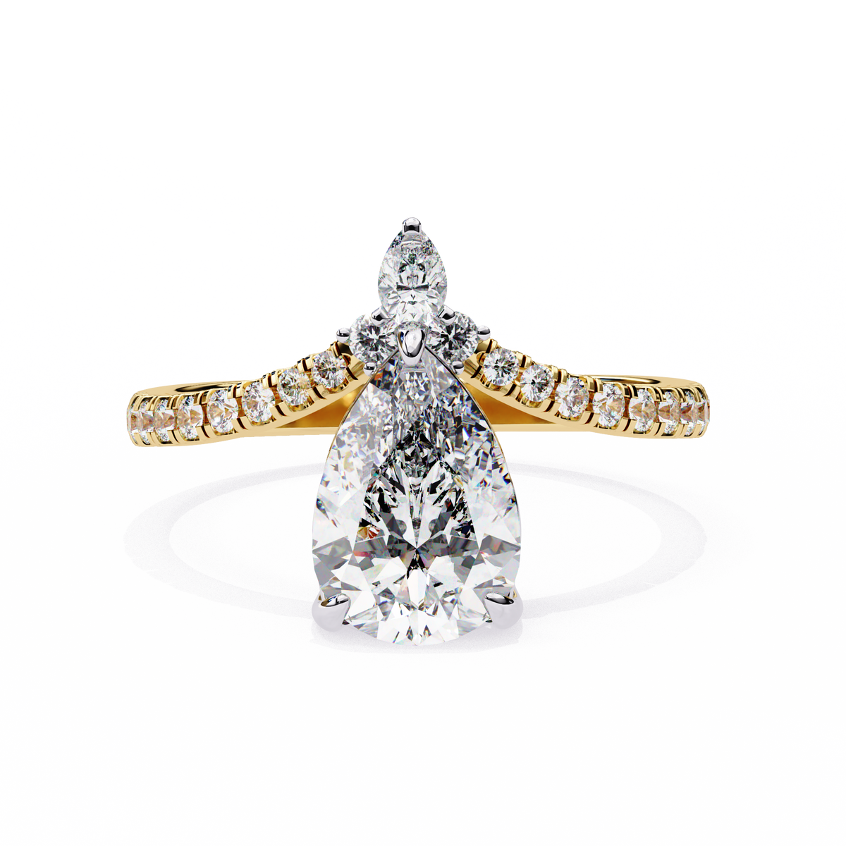 Gold and silver pear-shaped diamond ring on a white background