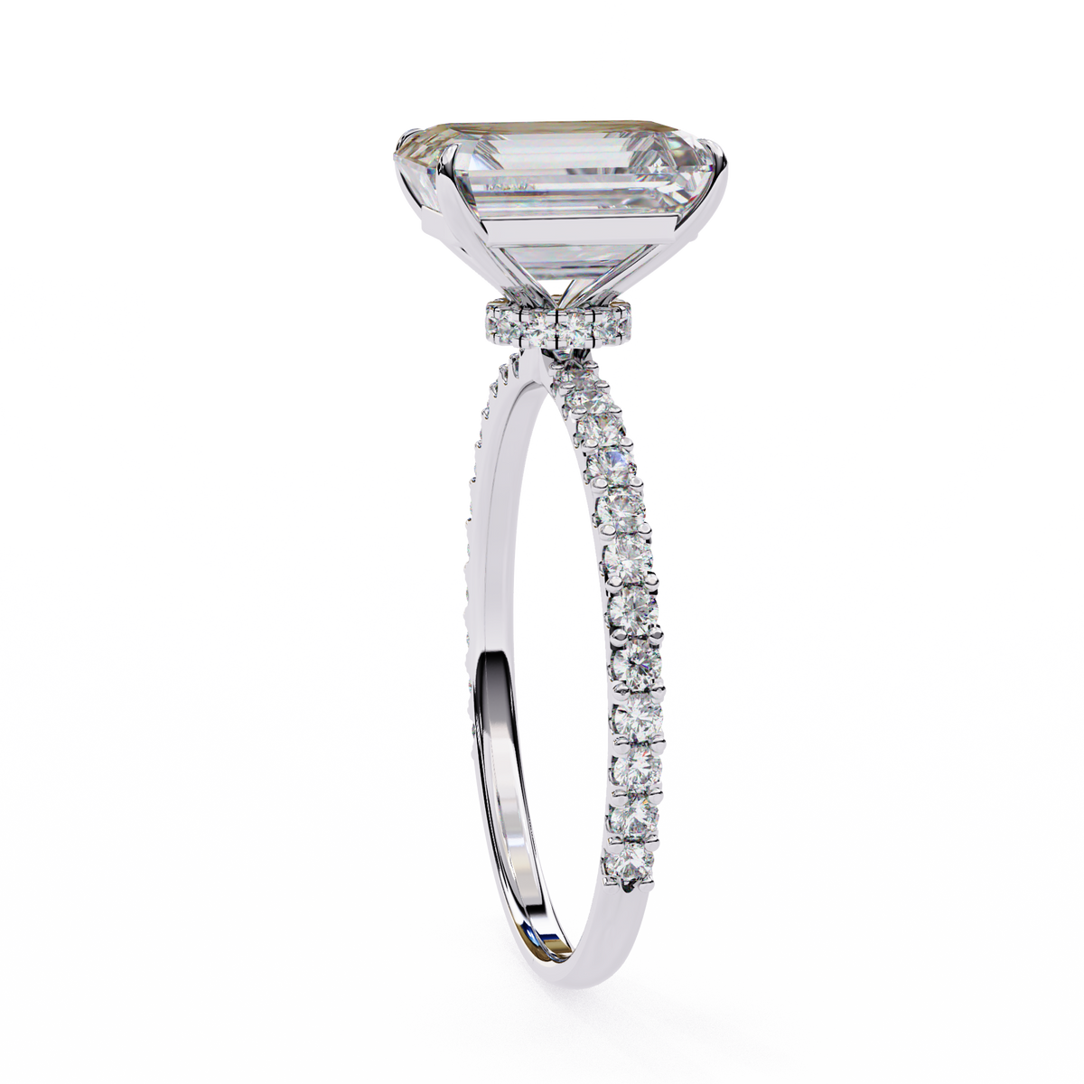 A diamond engagement ring featuring a large emerald-cut center stone in a white metal setting with a pavé band, shown on a clean white background.