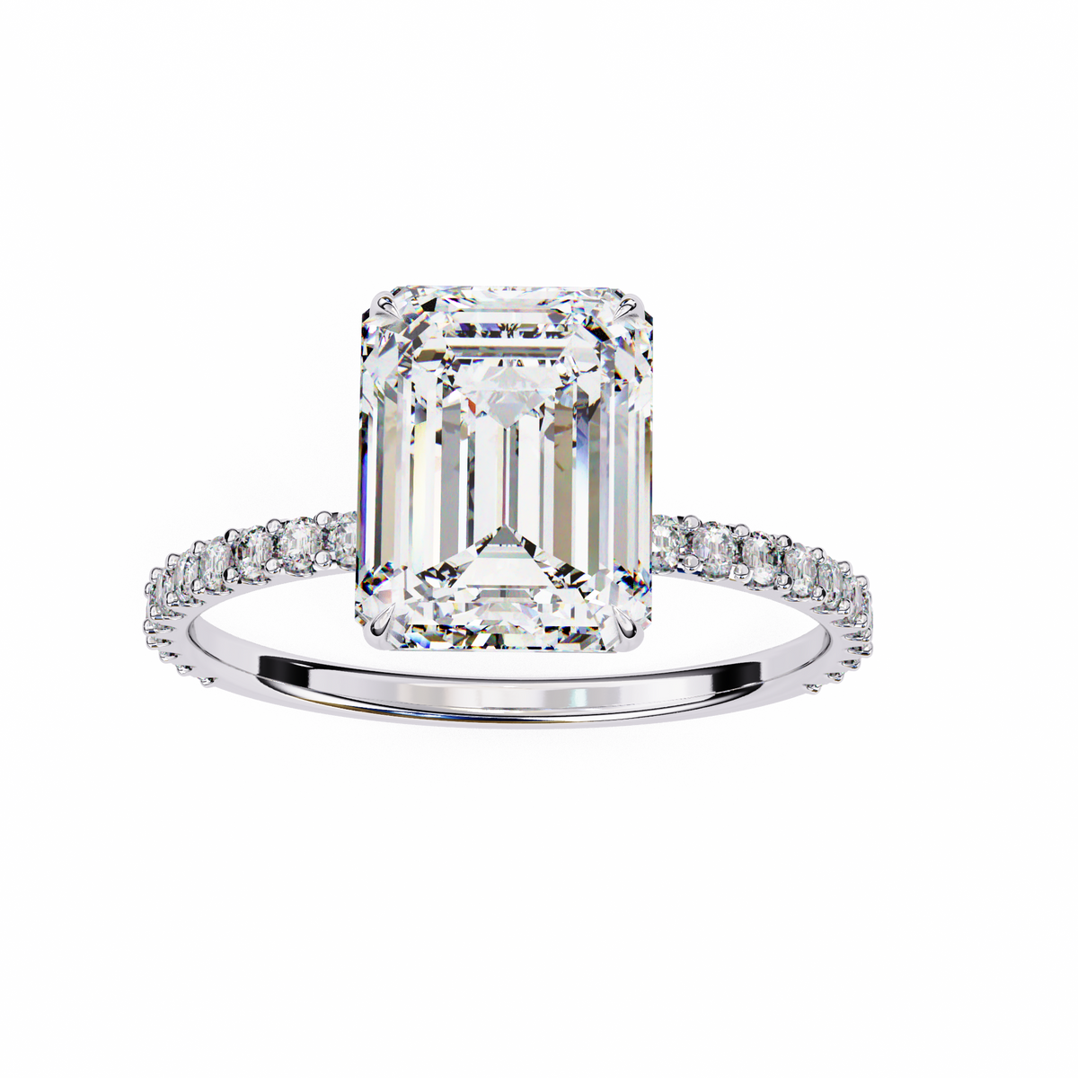 Diamond ring with a large emerald-cut diamond and smaller diamonds on the band against a white background