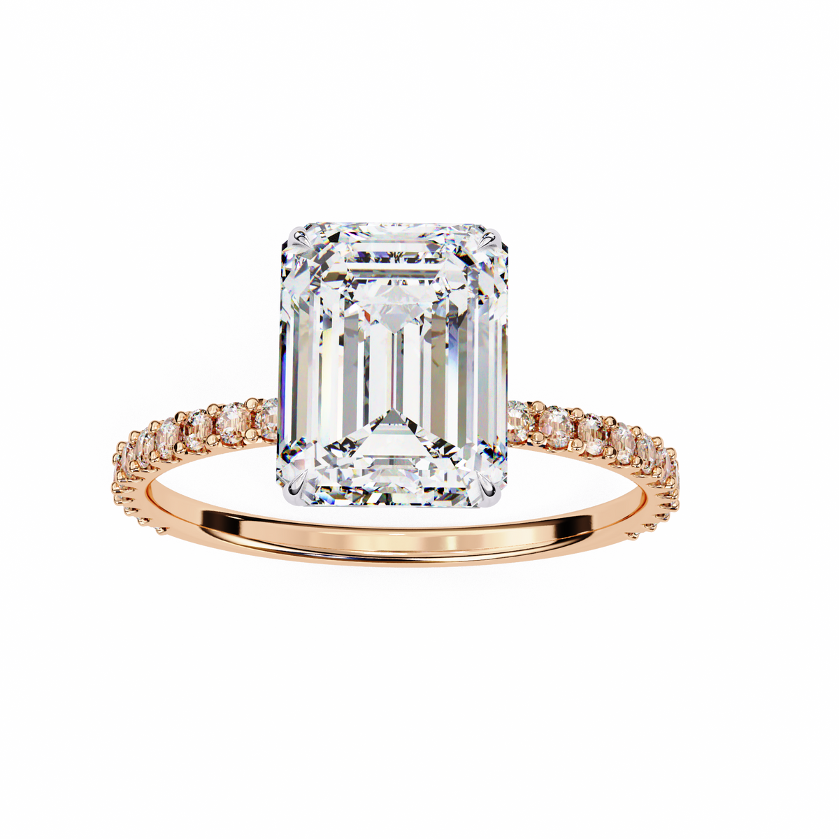 Rose gold ring with a large emerald-cut diamond and smaller diamonds on the band against a white background