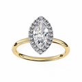 Gold ring with a pear-shaped diamond and smaller diamonds on a white background