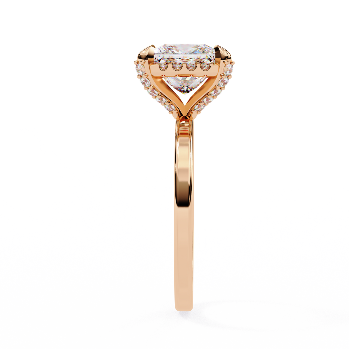 Rose gold ring with a heart-shaped diamond on a white background