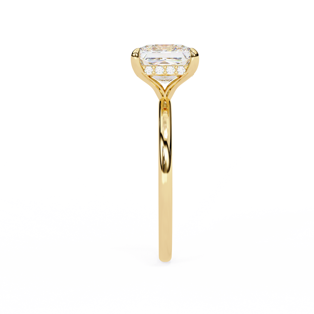Gold ring with a diamond on a white background