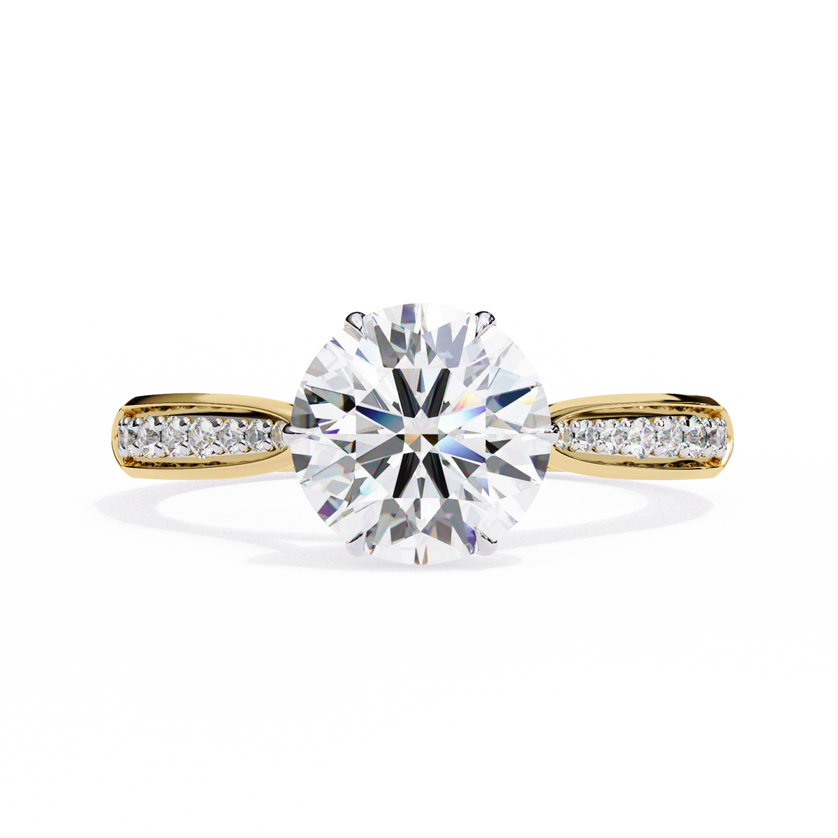Gold ring with a large diamond and smaller diamonds on the band against a white background