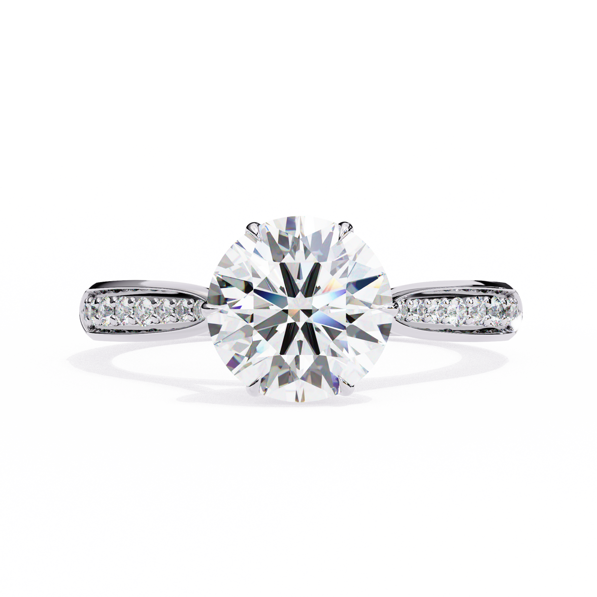 Diamond ring with a large central gemstone and smaller stones on the band against a white background