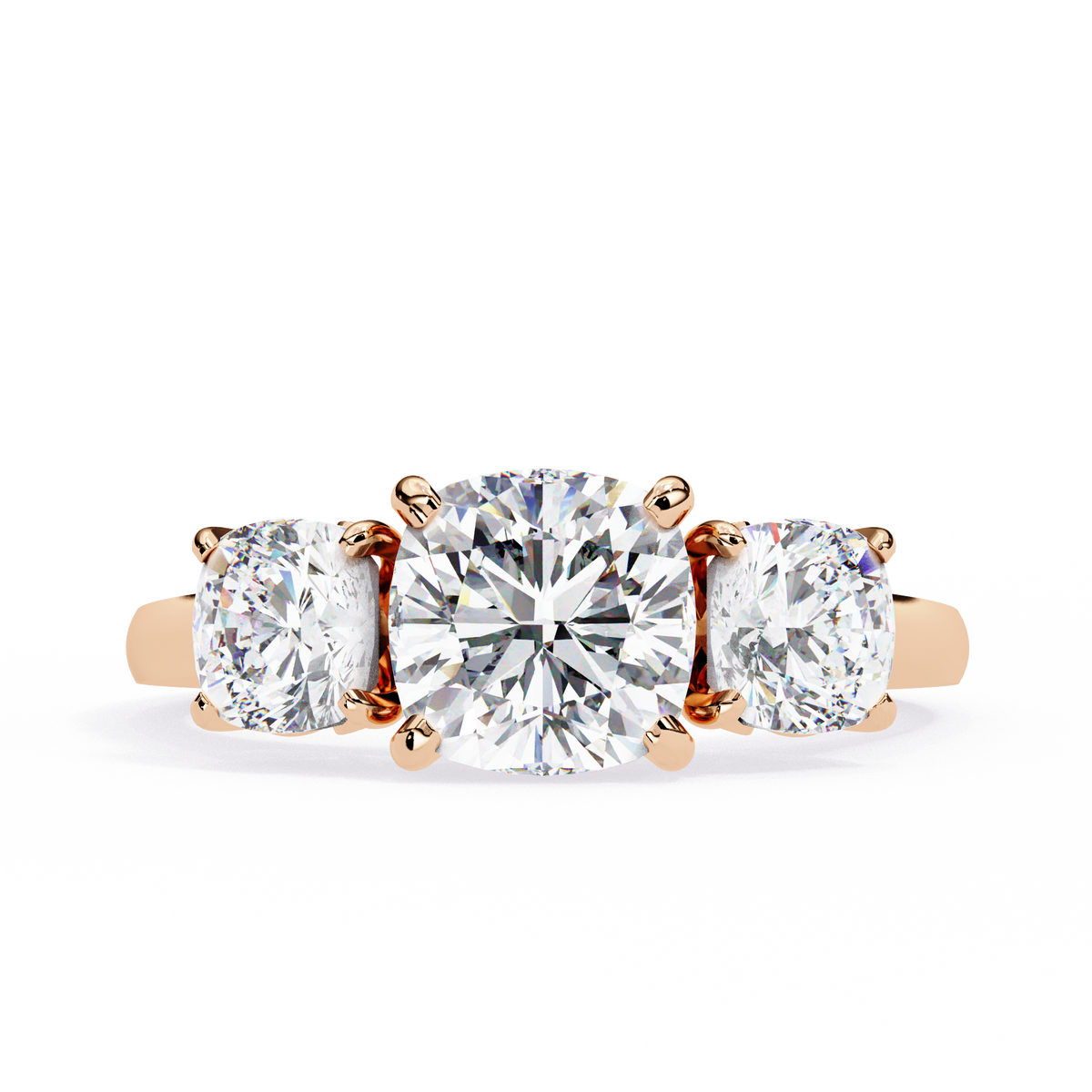 Rose gold three-stone diamond ring on a white background