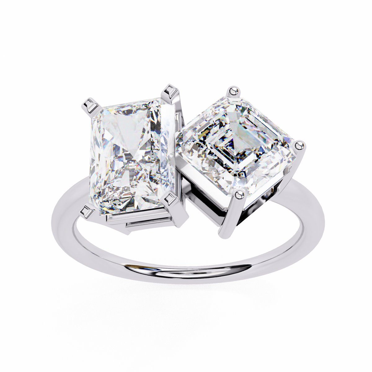 Silver ring with two large square-cut diamonds on a white background