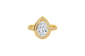 A yellow gold ring featuring a large pear-cut diamond center stone surrounded by a halo of smaller round diamonds, with a split shank also paved with diamonds, shown on a plain white background.