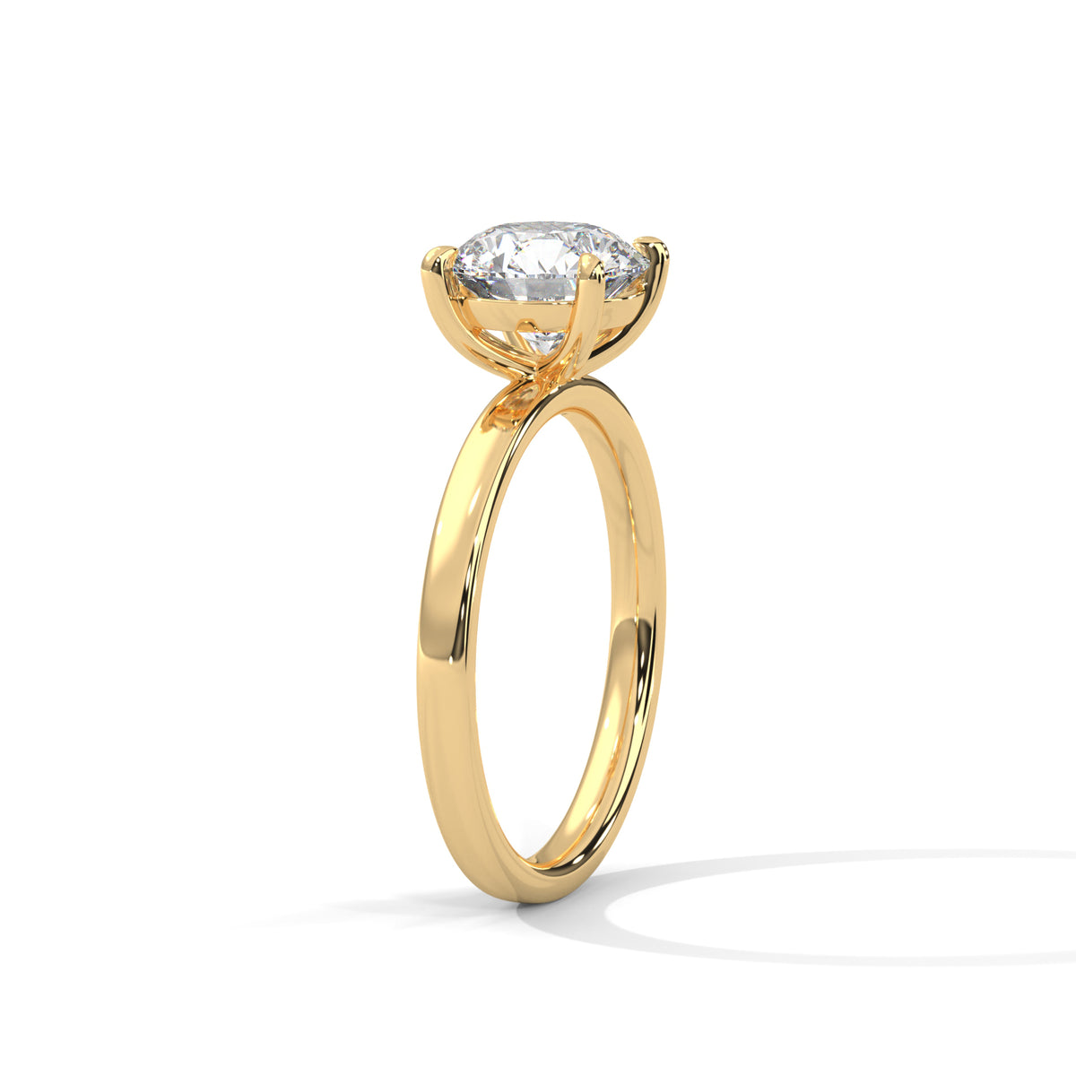 Gold ring with a diamond on a white background