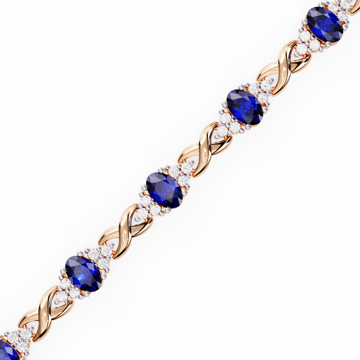 Rose gold bracelet with blue gemstones on a white background