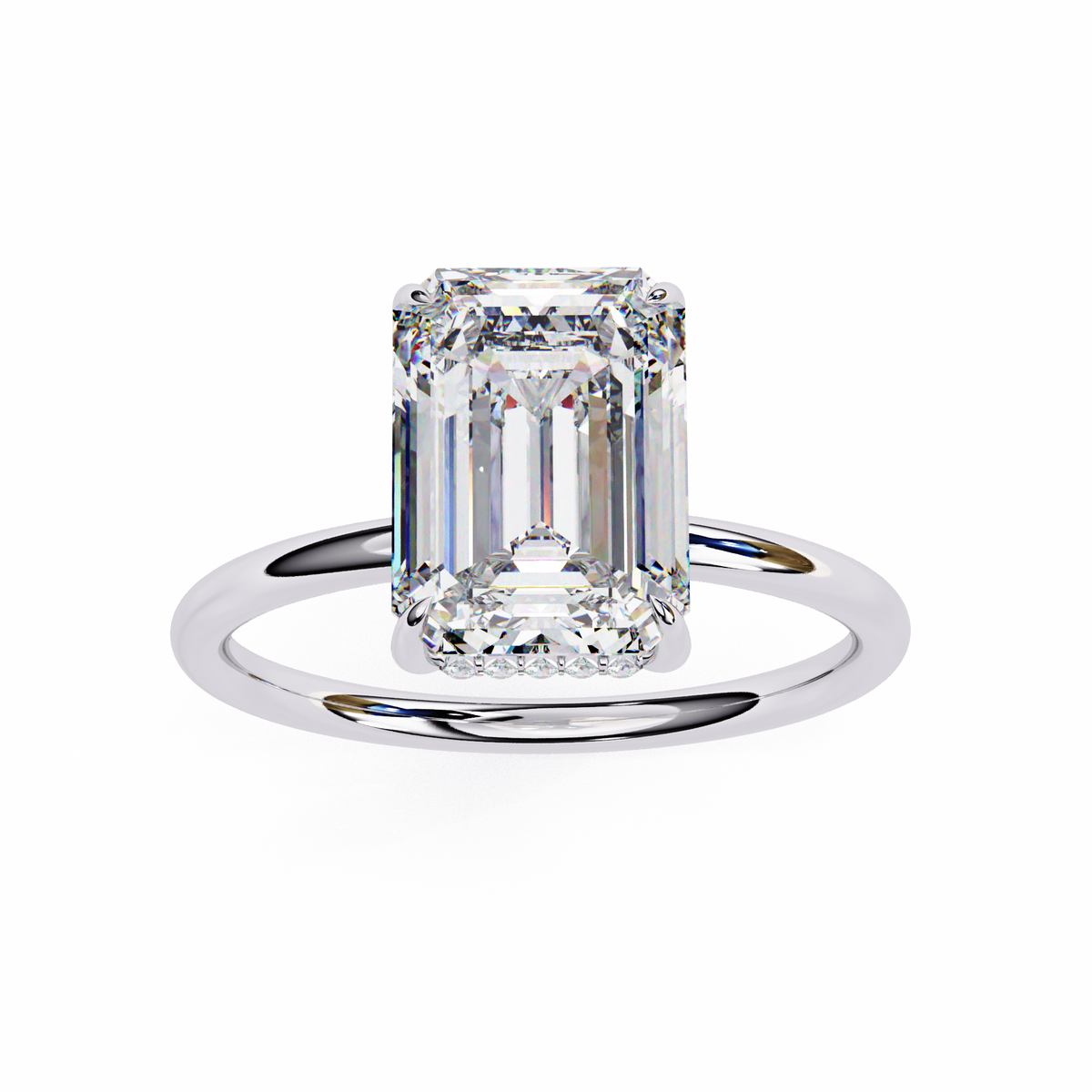 Diamond ring with emerald-cut diamond on a white background