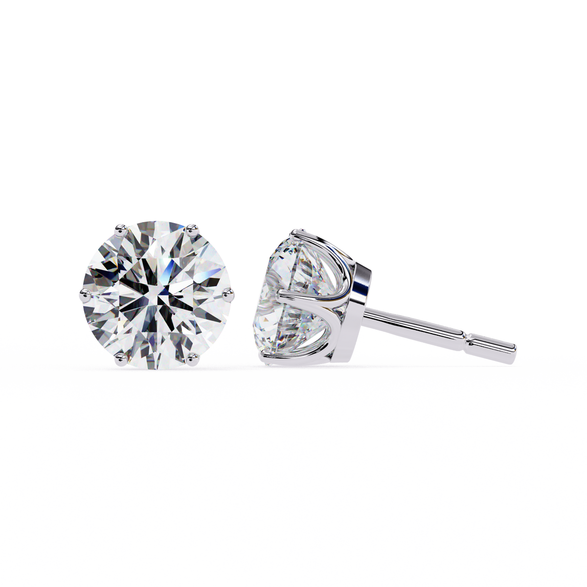 Pair of diamond stud earrings on a white background