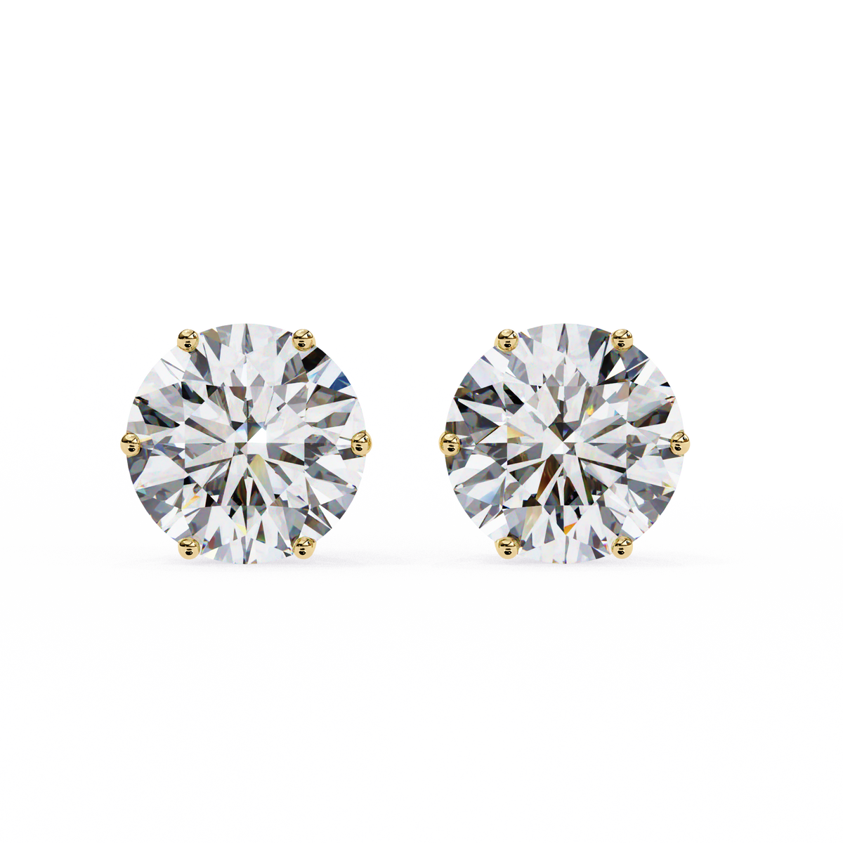 Pair of diamond stud earrings on a white background