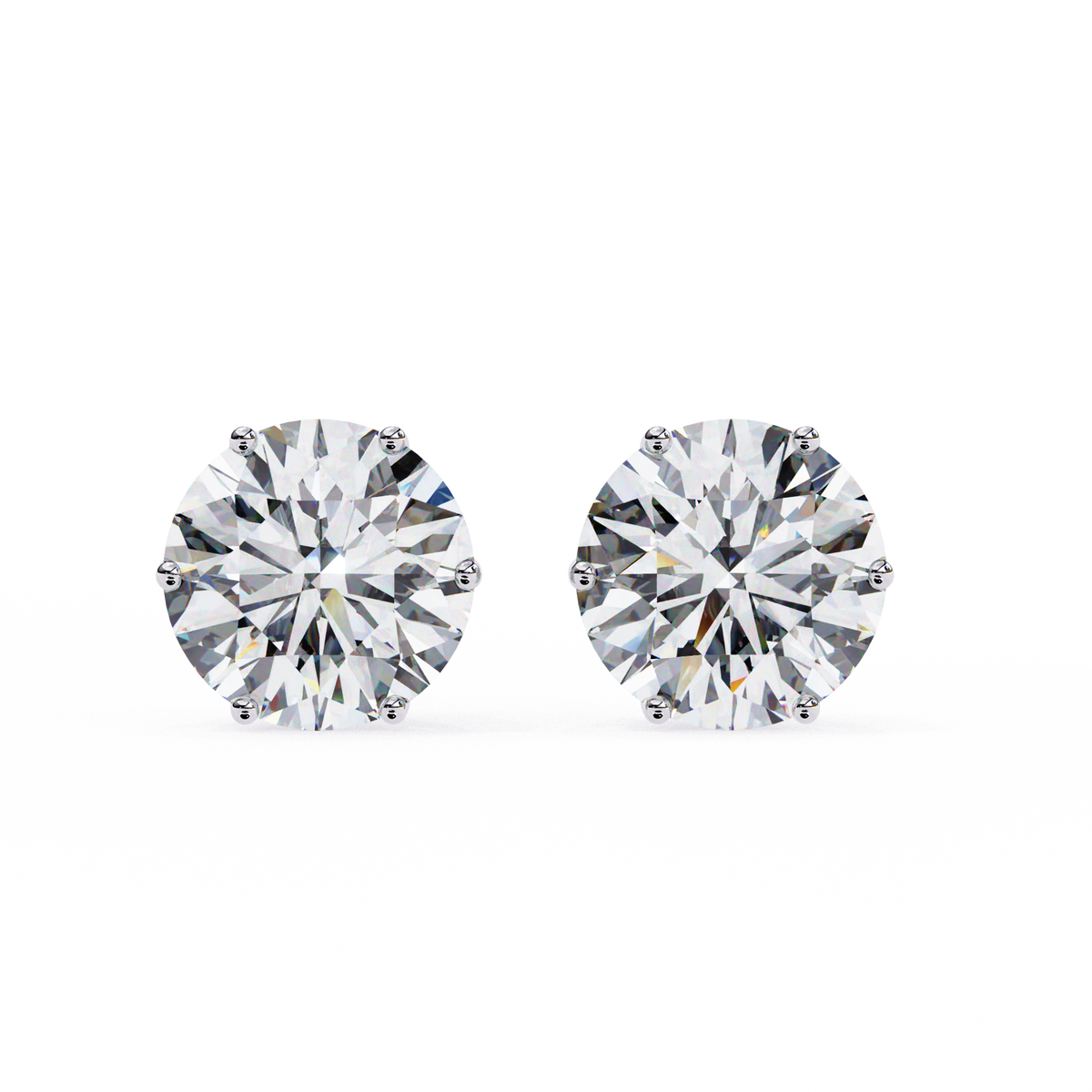 Pair of round cut diamond stud earrings on a white background
