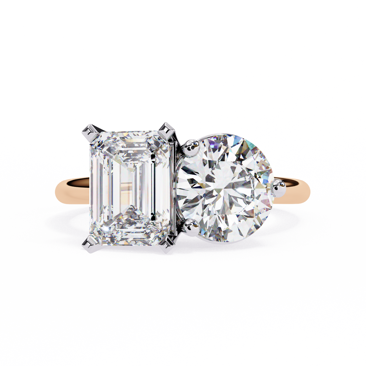 Diamond ring with emerald-cut and round-cut diamonds on a white background