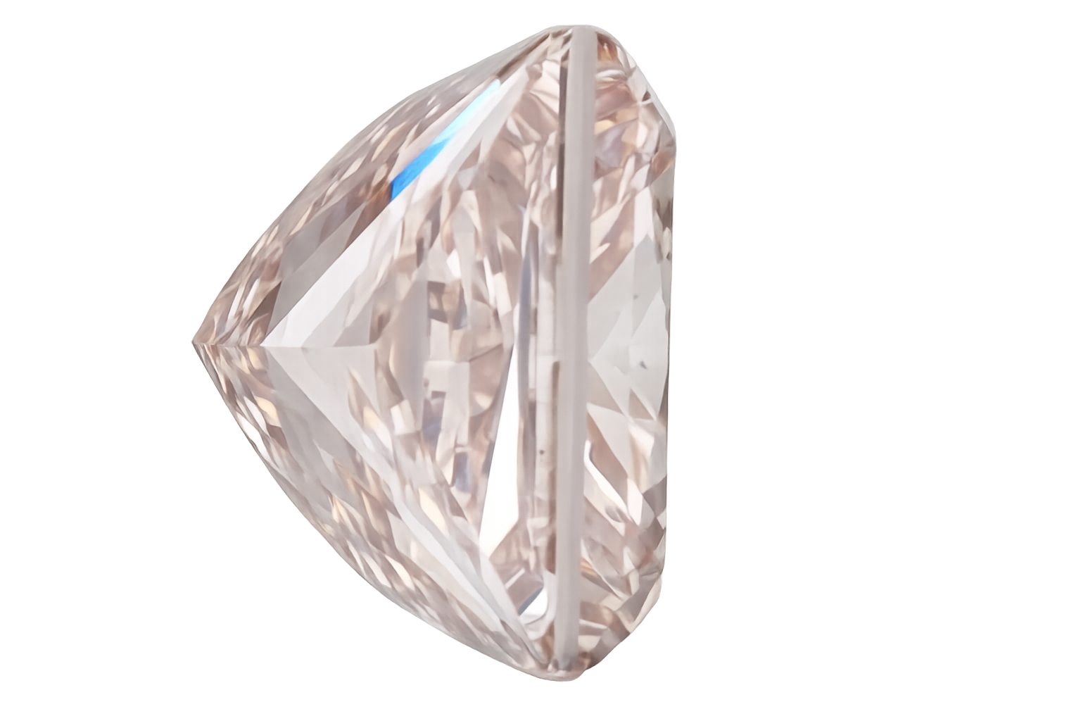 A single faceted clear gemstone with a triangular shape, shown on a plain white background.