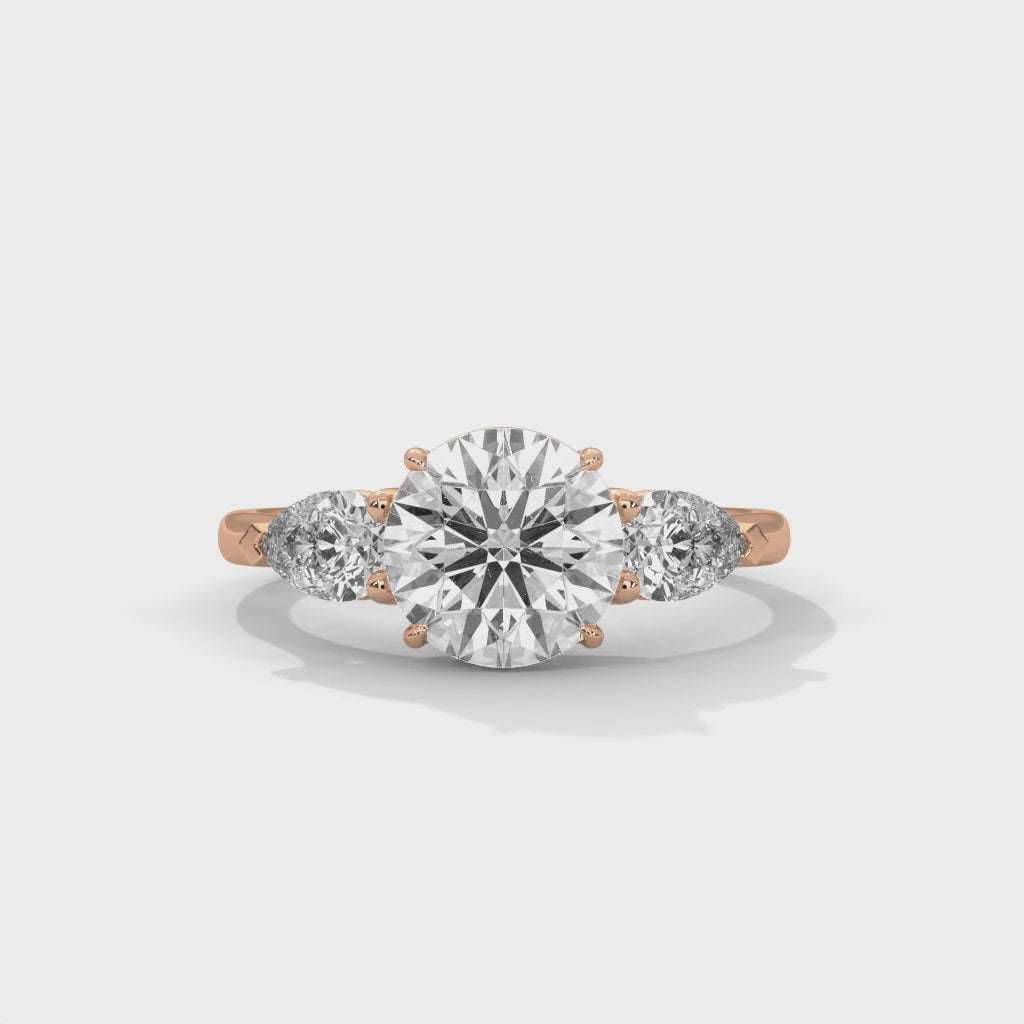 Three-Stone Round & Pear Diamond Engagement Ring